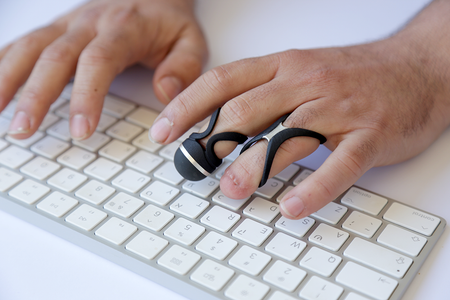 Assistive Typing Tools for Amputated Fingers, Designed to Enable Fluent and More Comfortable Typing on a Keyboard.